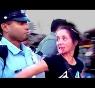 COP SUCKER-PUNCHES WOMAN!!